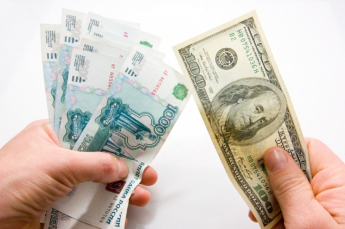 В Sberbank CIB назвали условия роста доллара до 70 рублей