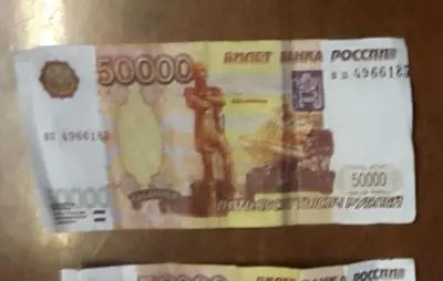 62 летняя женщина два раза пыталась расплатиться за продукты купюрой в 50 тысяч