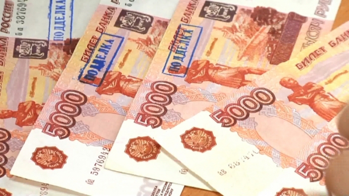В Якутские банки попали фальшивые пятитысячные купюры